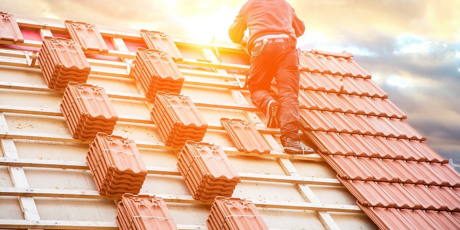 bigstock-Roofer-Working-On-Roof-Structu-272657719.jpg